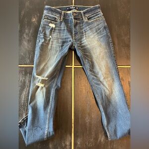 Hollister Men's Medium Blue Slim Straight Jeans with Distressed Knees